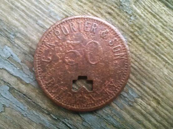 $0.50 company scrip submitted by Carl Smith.  Found metal detecting.
