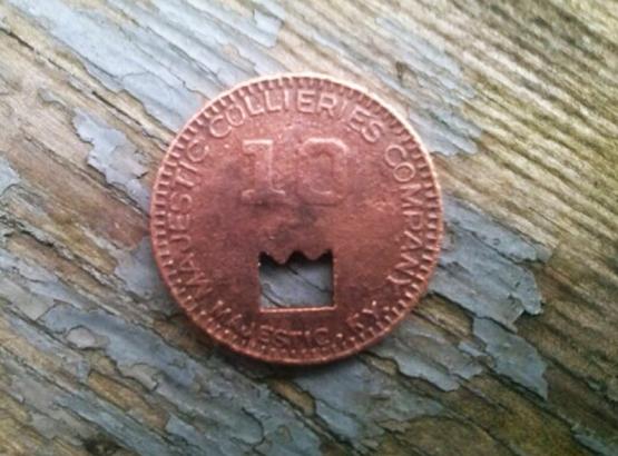 $0.10 company scrip submitted by Carl Smith.  Found metal detecting.