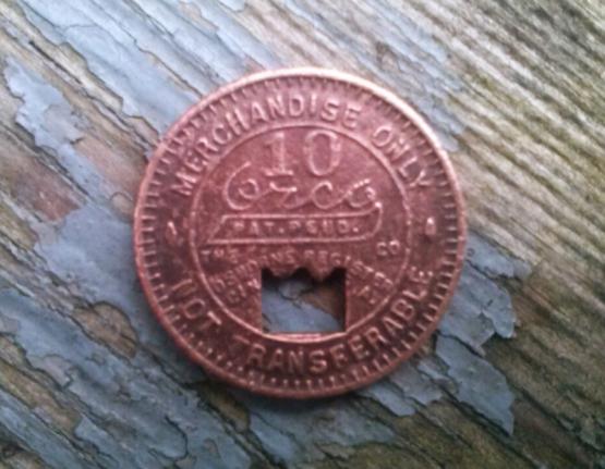 $0.10 company scrip submitted by Carl Smith.  Found metal detecting.