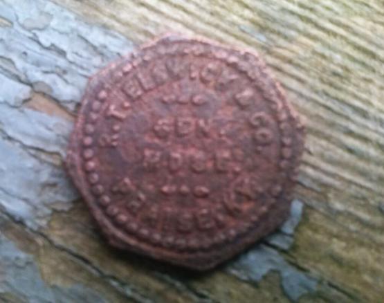 $0.05 company scrip submitted by Carl Smith.  Found metal detecting.