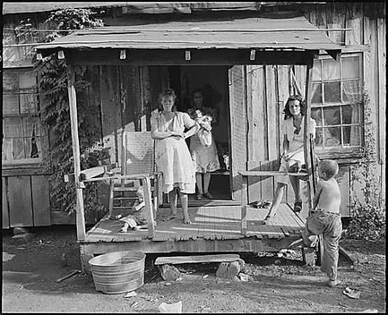 &quot;Miners&#039; wives and children on the front porch of a typical, fifty year old house. Kentucky Straight Creek Coal Company, Belva Mine, abandoned after explosion [in] Dec. 1945, Four Mile, Bell County, Kentucky., 09/04/1946&quot;  From the National Archives, Records of the Solid Fuels Administration for War 1937-1948, Report of the Medical Survey of the Bituminous Coal Industry 1946-1947. National Archives Identifier 541201  <a href="http://research.archives.gov/description/541201">http://research.archives.gov/description/541201</a>