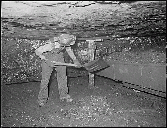 &quot;Harry Fain, coal loader, loads &quot;bug dust&quot; which is mixed slate and coal ground by the undercutting machine. He will load about 2 tons net coal in this operation. His total loading for the day will be 16-17 tons. Coal seam is 4 feet thick. Inland Steel Company, Wheelwright #1 &amp; 2 Mines, Wheelwright, Floyd County, Kentucky., 09/24/1946.&quot;  From the National Archives, Records of the Solid Fuels Administration for War 1937-1948.  Series: Photographs of the Medical Survey of the Bituminous Coal Industry 1946-1947.  <a href="http://research.archives.gov/description/541478">http://research.archives.gov/description/541478</a>